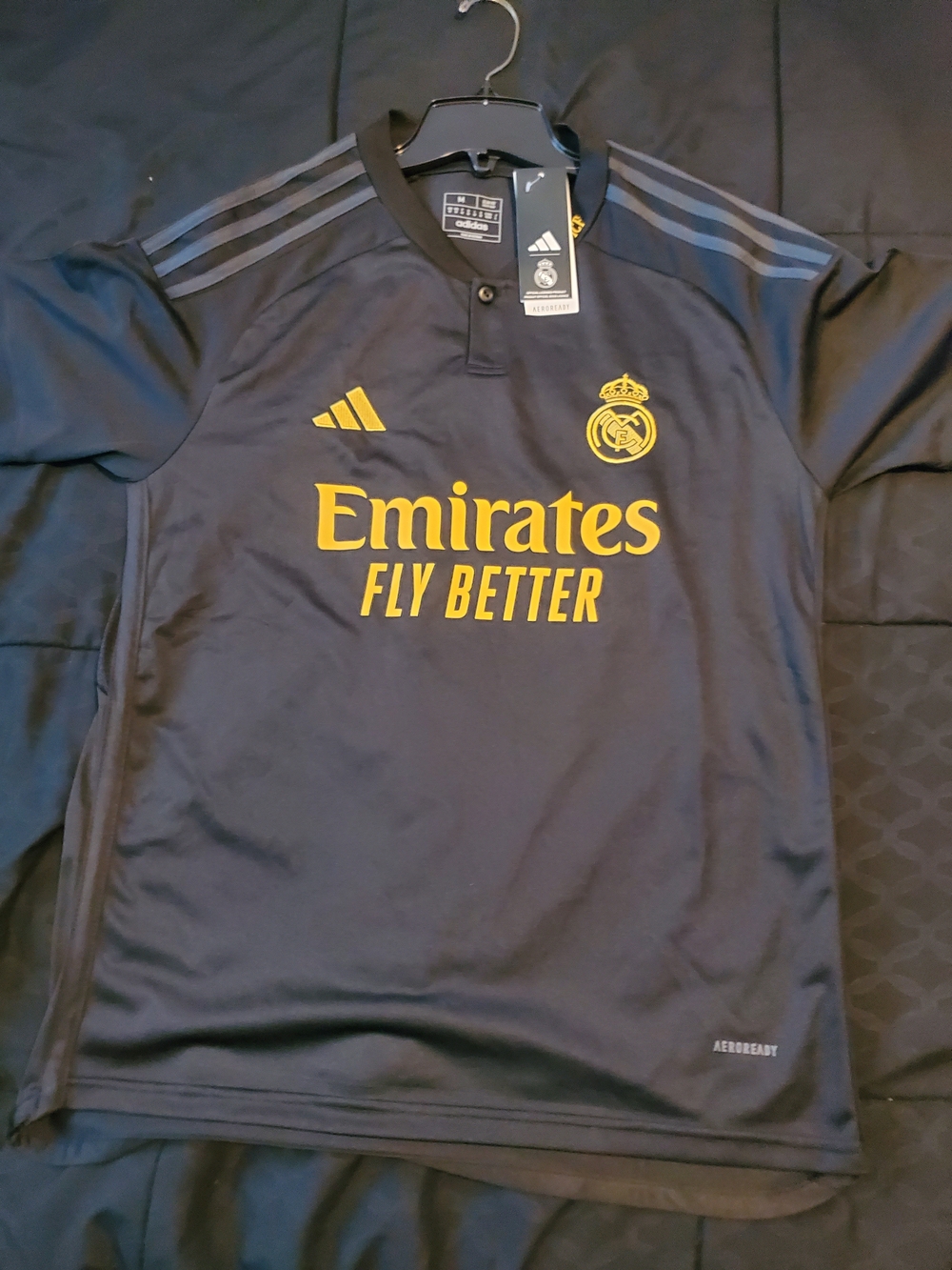 Real Madrid Black Jersey with Gold Emirates Logo